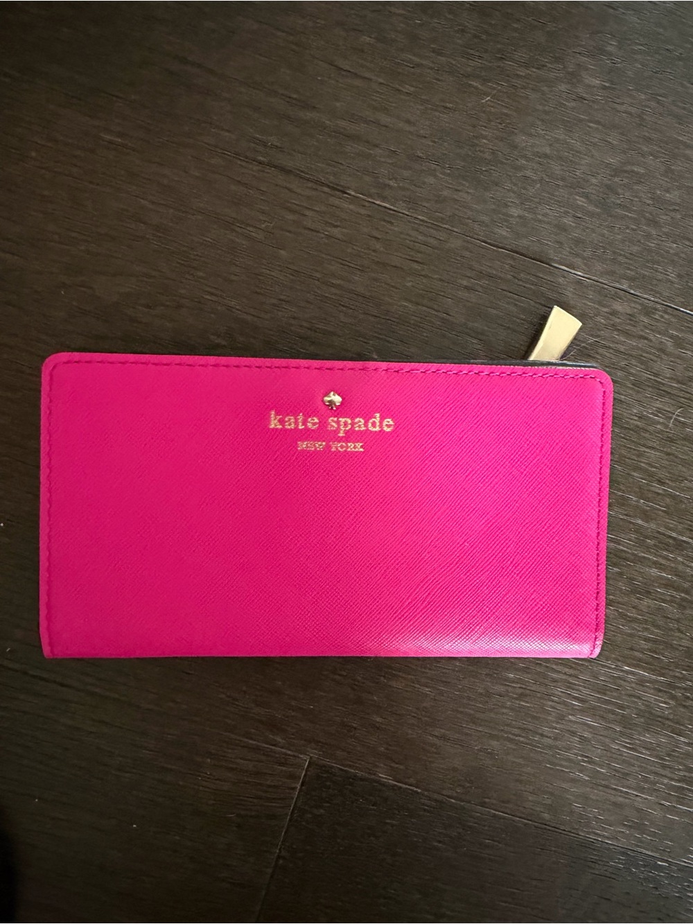 kate spade hot pink zip-around wallet with gold logo